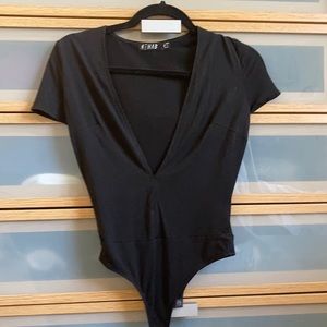 Black Plunging V Neck bodysuit with clasp